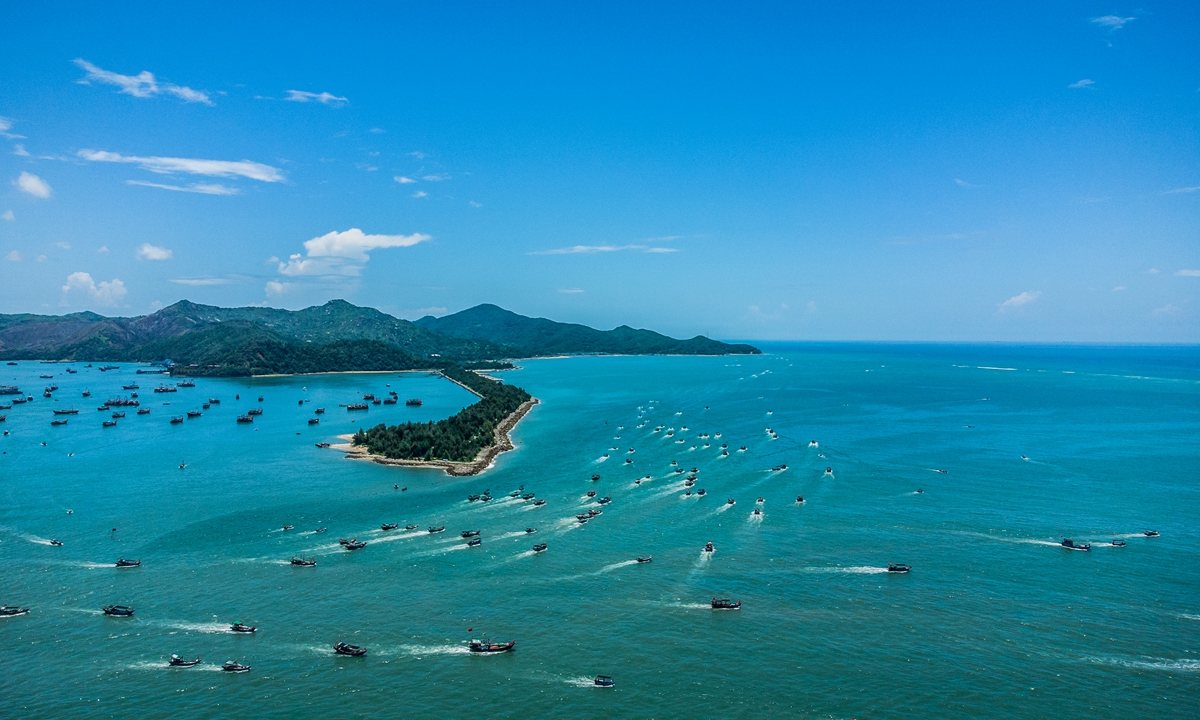 Fishing boats in Shanwei, South China's Guangdong Province sail out to fishing grounds in the South China Sea after the summer fishing moratorium ended on Monday. Photo: VCG