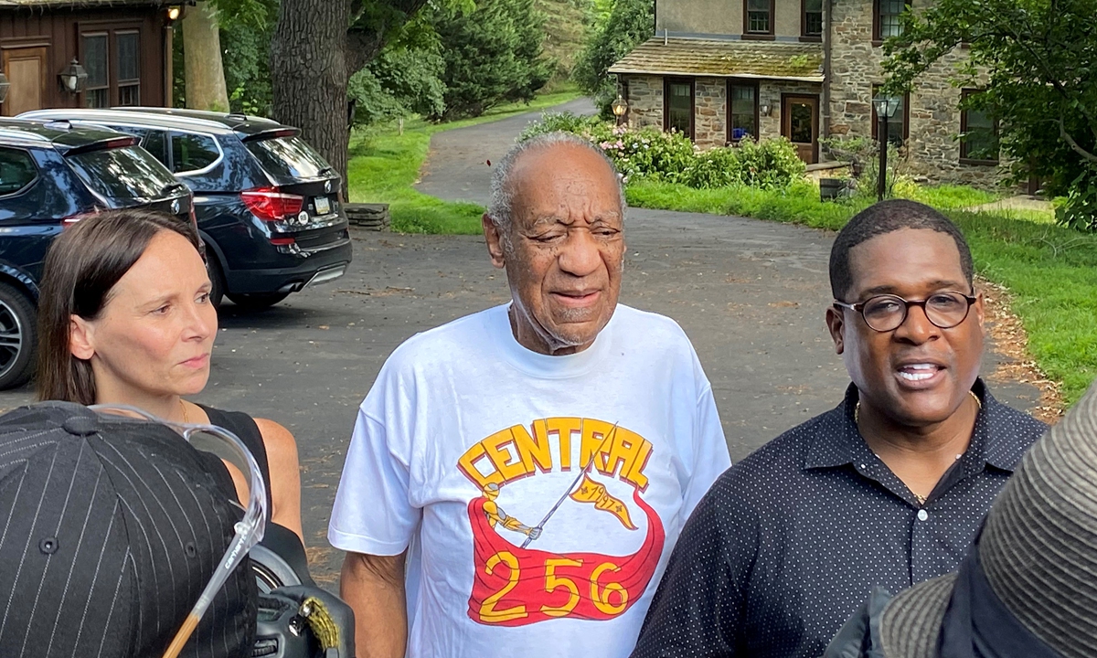 From left: Attorney Jennifer Bonjean, Bill Cosby and spokesperson Andrew Wyatt speak outside of Bill Cosby's home on June 30, in Cheltenham, Pennsylvania. Photo: AFP