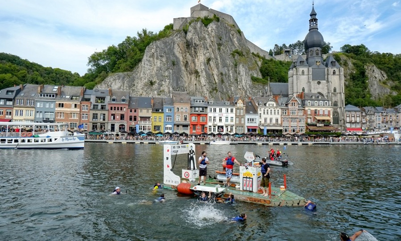 Participants attend the International Bathtub Regatta on the Meuse River in Dinant, Belgium, on Aug. 15, 2021.(Photo: Xinhua)