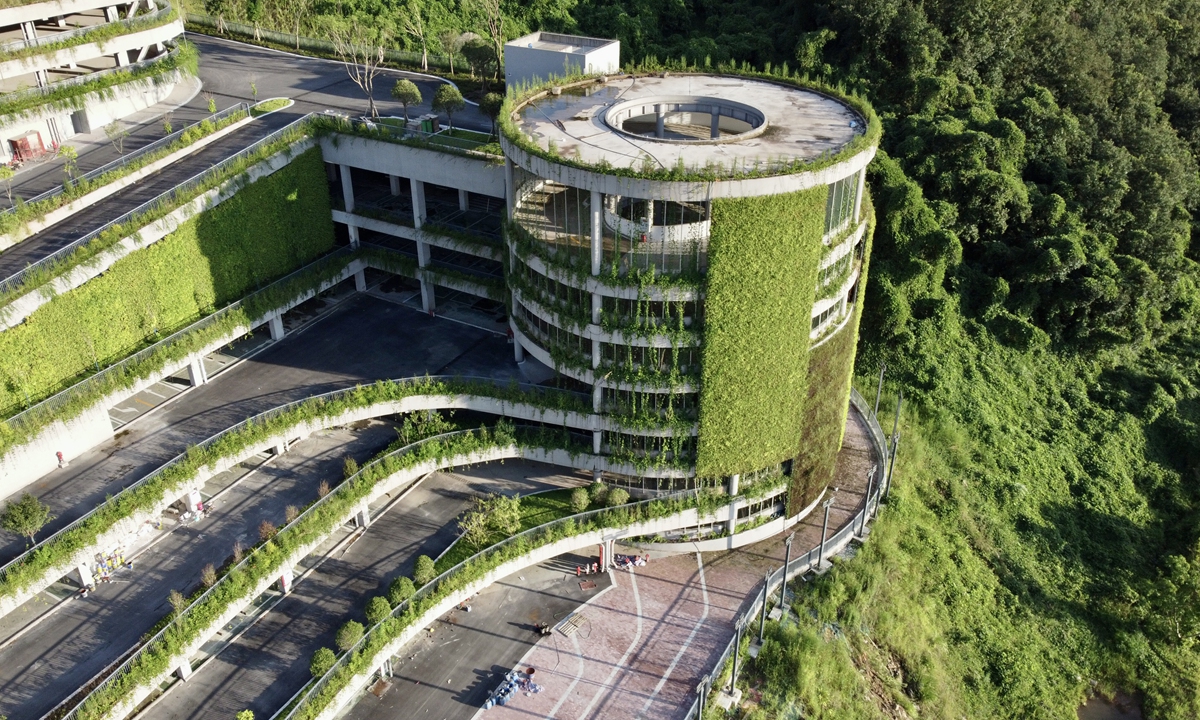 A seven-story rotating parking lot in Southwest China's Chongqing Municipality, known as 