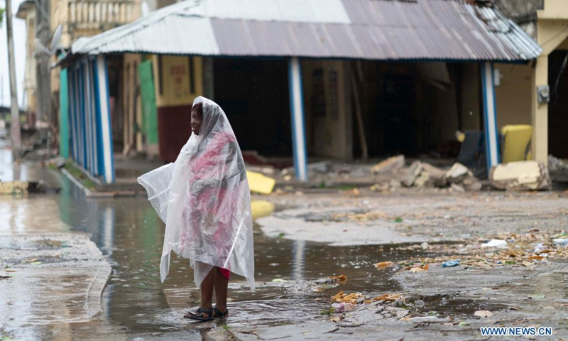 A woman walks on a street after the earthquake in Les Cayes, Haiti, Aug. 17, 2021. The death toll from a powerful earthquake that struck southwest Haiti on Saturday climbed to 1,941, the Caribbean island's Civil Protection Agency reported on Tuesday. (Photo: Xinhua)