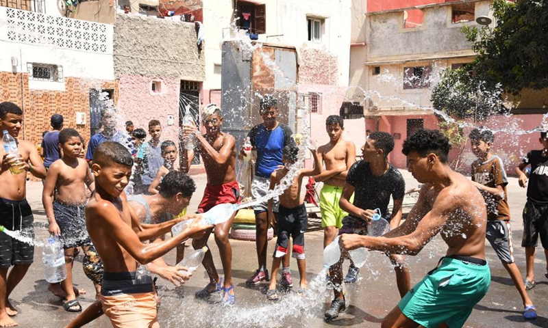 Children play with water on Ashura in Rabat, Morocco, on Aug. 19, 2021. Ashura takes place on the 10th day of Muharram, the first month in the Islamic lunar calendar.Photo:Xinhua