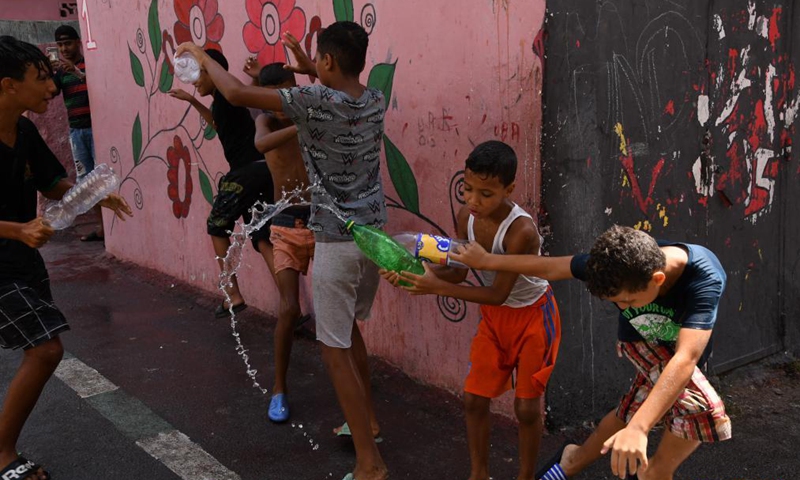 Children play with water on Ashura in Rabat, Morocco, on Aug. 19, 2021. Ashura takes place on the 10th day of Muharram, the first month in the Islamic lunar calendar.Photo:Xinhua