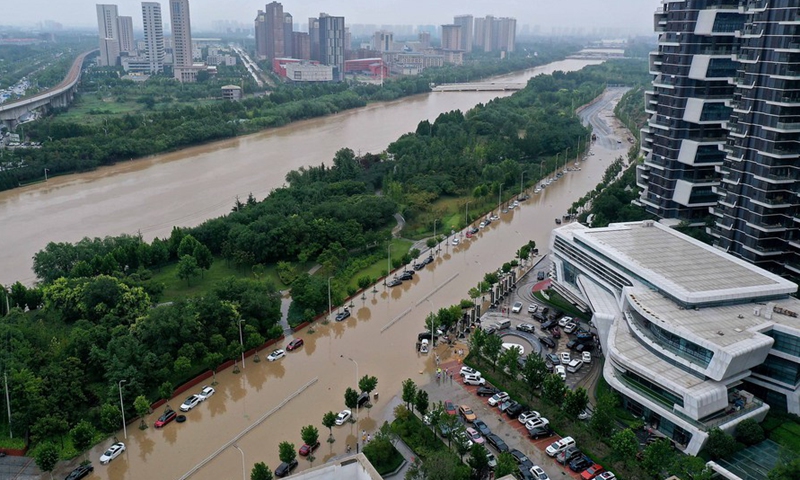 Aerial photo taken on July 21, 2021 shows submerged roads in flood-hit Zhengdong New District of Zhengzhou, central China's Henan Province.Photo:Xinhua