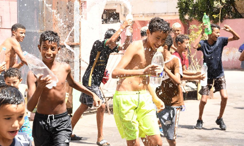 Children play with water on Ashura in Rabat, Morocco, on Aug. 19, 2021. Ashura takes place on the 10th day of Muharram, the first month in the Islamic lunar calendar.Photo:Xinhua
