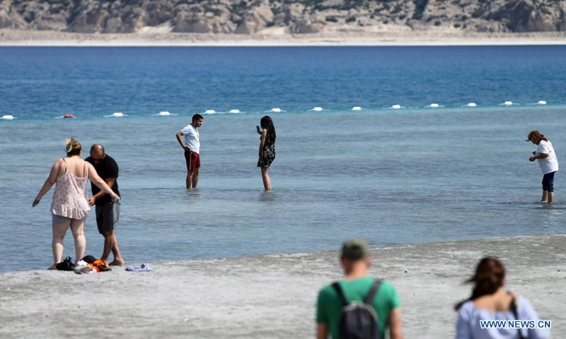 Tourists visit Salda Lake in Burdur province, Turkey, Aug. 21, 2021. Photo: Xinhua