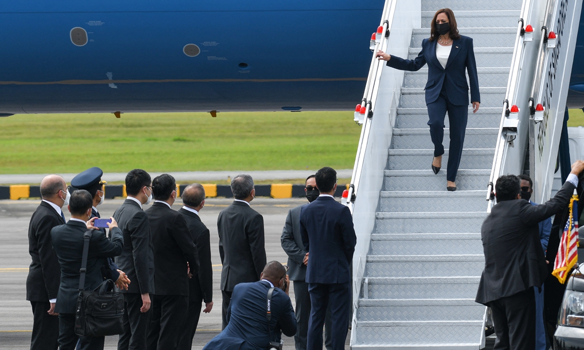 US Vice President Kamala Harris steps off Air Force Two as she arrives at Paya Lebar Base airport in Singapore on Sunday. Photo: AFP