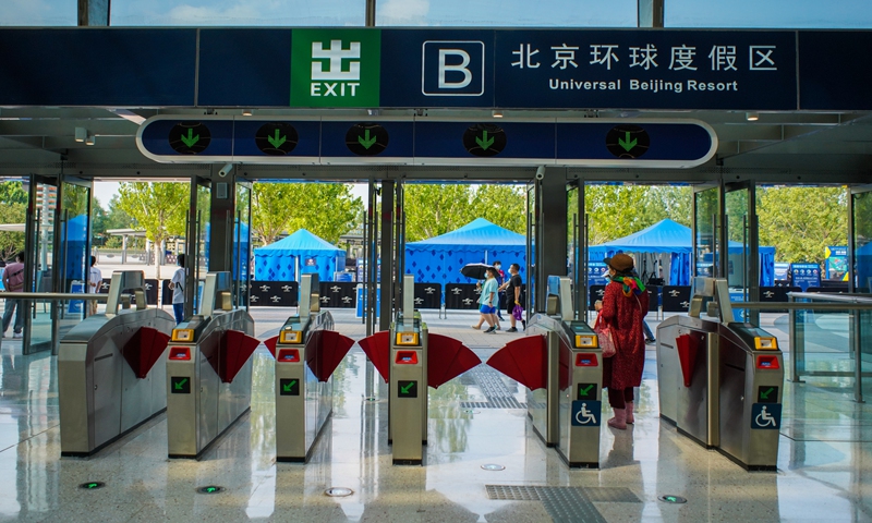 The exit of the Universal Beijing Resort metro station, the terminus of the Batong line, is seen. The line connected with metro line 1 on Sunday. The connected line runs through the east and west of Beijing, passing Tian'anmen Square and the central business district. Universal Beijing Resort station is also the terminus of line 7, an almost parallel line that runs to the south of line 1. Photo: VCG