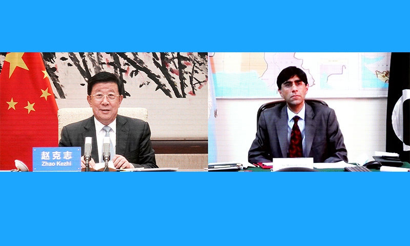 Chinese State Councilor and Minister of Public Security, Zhao Kezhi (left), meets online with Moeed W. Yusuf, National Security Adviser to the Prime Minister of Pakistan on August 24, 2021. Photo: Ministry of Public Security