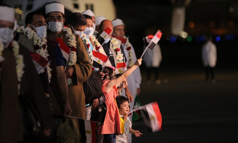 After being evacuated from Afghanistan's capital Kabul, Egyptians arrive safely at an airport in Cairo, Egypt, Aug. 23, 2021. (Photo: Xinhua)