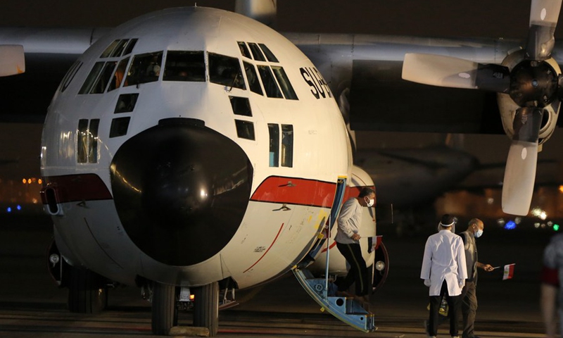 After being evacuated from Afghanistan's capital Kabul, Egyptians get off the plane at an airport in Cairo, Egypt, Aug. 23, 2021. (Photo: Xinhua)