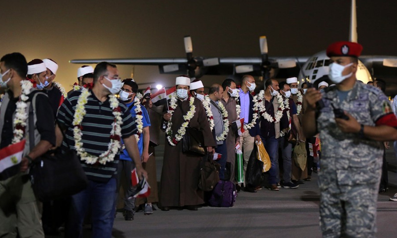After being evacuated from Afghanistan's capital Kabul, Egyptians arrive safely at an airport in Cairo, Egypt, Aug. 23, 2021. (Photo: Xinhua)
