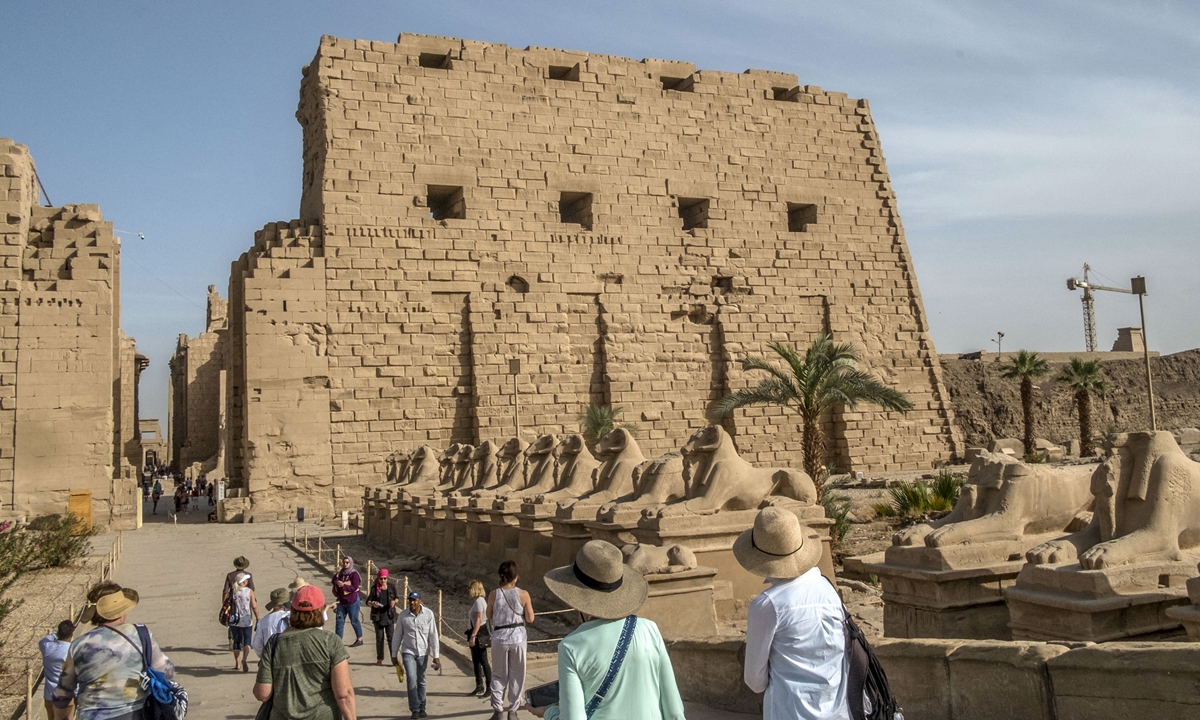Tourists visit the Karnak Temple Complex in Egypt's southern city of Luxor on March 10, 2020. Photo:  AFP