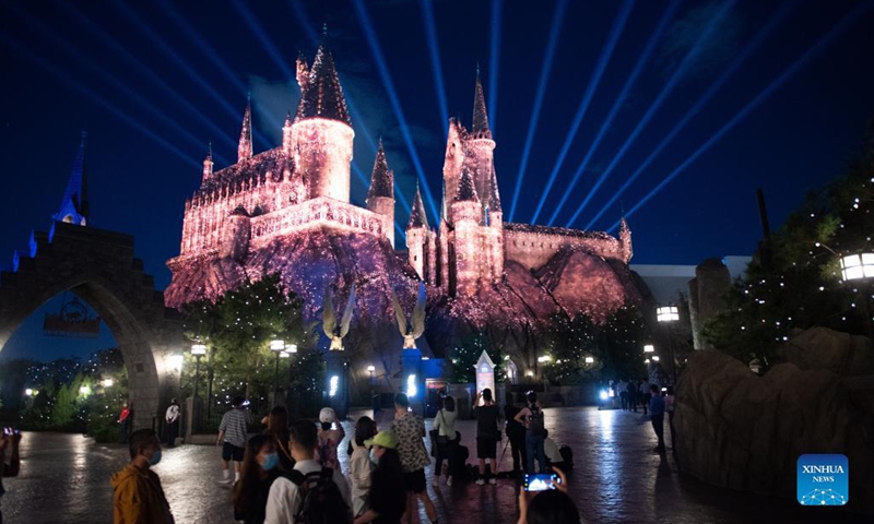 Photo taken on Aug. 25, 2021 shows a light show at the Universal Beijing Resort (UBR) in Beijing, capital of China. The UBR will officially start a trial opening for invite-only guests on Sept. 1 with comprehensive COVID-19 prevention and control measures.Photo:Xinhua