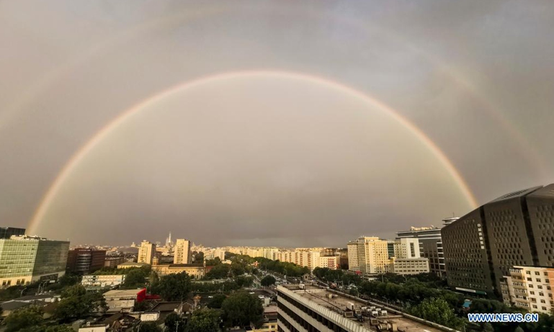 Cellphone photo taken on Aug. 26, 2021 shows a double rainbow appearing in the sky over Beijing, capital of China.Photo:Xinhua