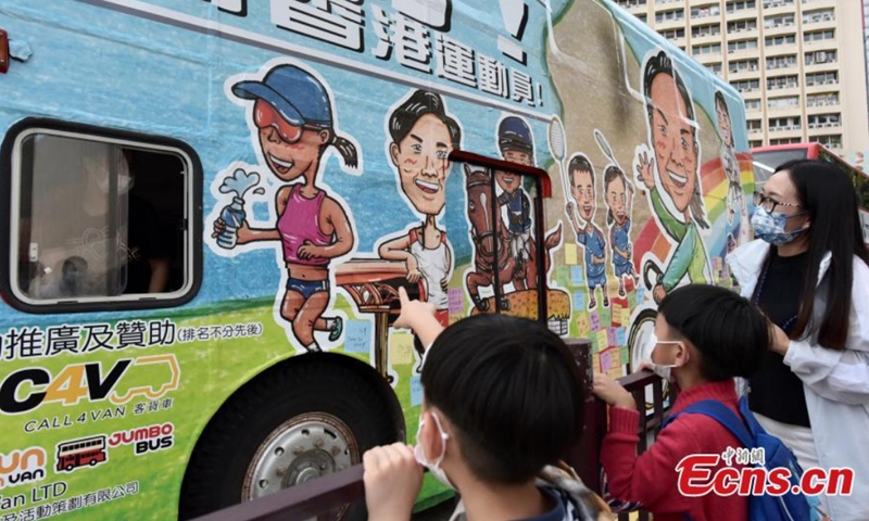 The retired Jumbo bus carries an advertisement in support of Hong Kong athletes during a parade, Hong Kong, Aug. 29, 2021.Photo: CNSphoto 