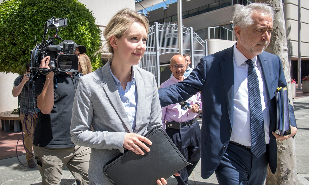 Elizabeth Holmes, founder and former chief executive officer of Theranos Inc, exits federal court in San Jose, California, US, on Monday, April 22, 2019. Photo:VCG