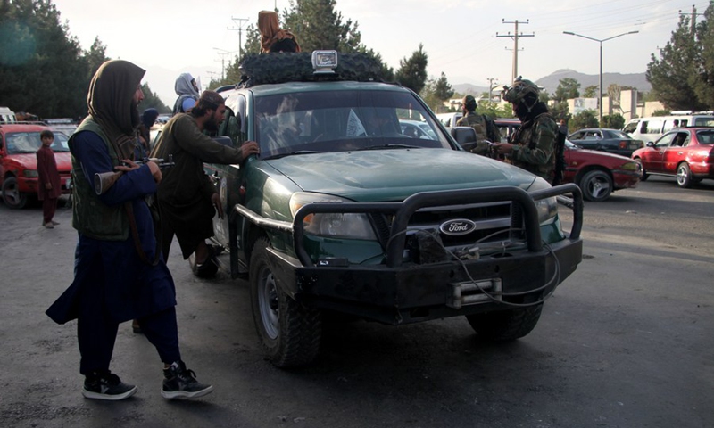 Taliban members are seen on a road in Kabul, capital of Afghanistan, Aug. 28, 2021.(Photo: Xinhua)