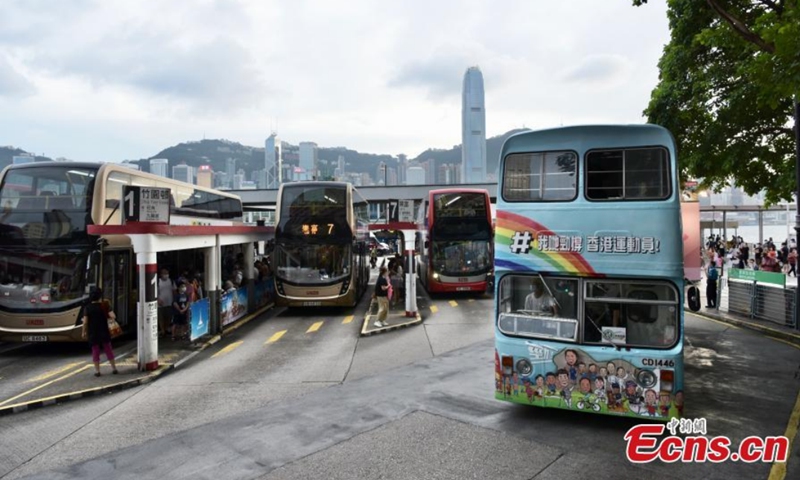 The retired Jumbo bus carries an advertisement in support of Hong Kong athletes during a parade, Hong Kong, Aug. 29, 2021.Photo: CNSphoto 