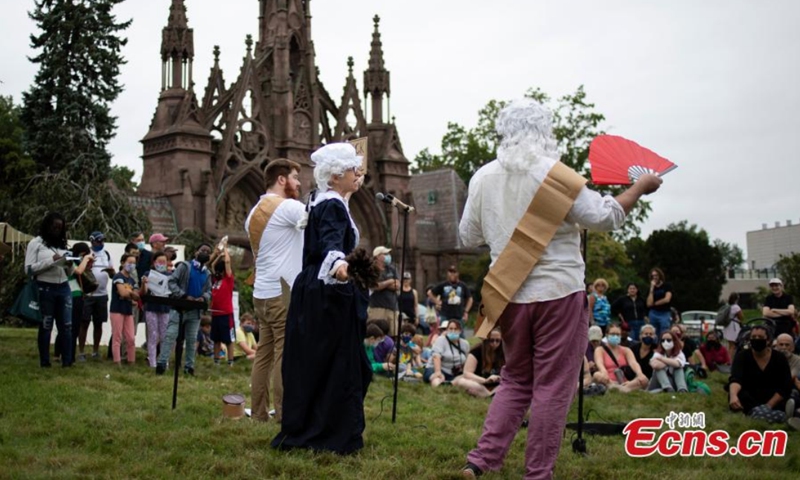 Actors perform historical stories at Green-Wood Cemetery, New York, the United States, Aug. 29, 2021.Photo: CNSphoto 