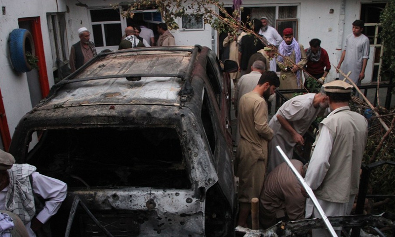 People gather at the site where a rocket struck in Kabul, capital of Afghanistan, on Aug. 29, 2021.(Photo: Xinhua)
