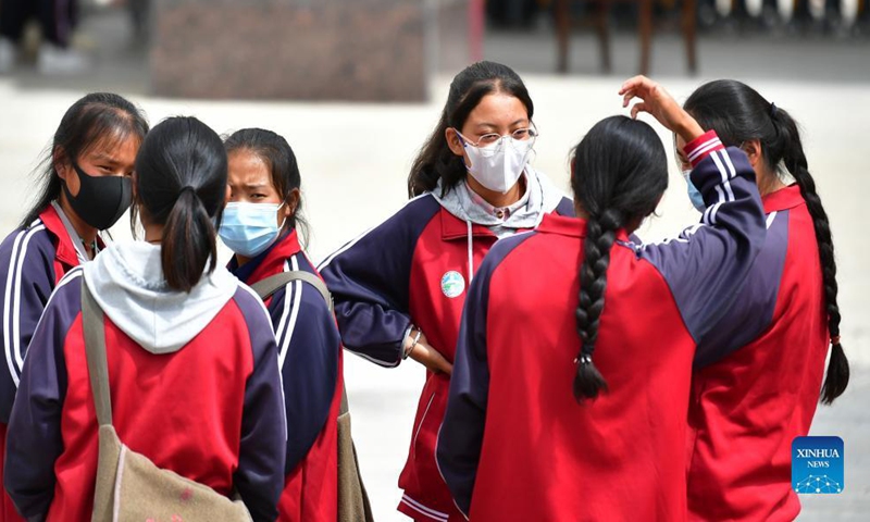 Students talk to each other on campus at Luqu Tibetan Middle School in Luqu County, Gannan Tibetan Autonomous Prefecture, northwest China's Gansu Province, Aug. 30, 2021.Photo:Xinhua