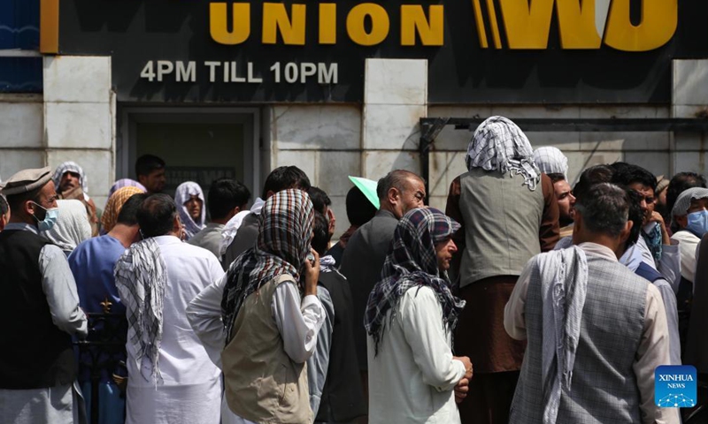 People line up in front of a bank in Kabul, capital of Afghanistan, Aug. 31, 2021.Photo:Xinhua
