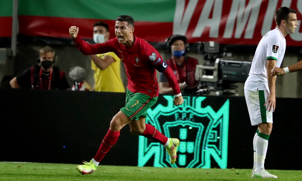 Portugal's Cristiano Ronaldo celebrates after scoring against the Republic of Ireland on Wednesday in Faro, Portugal. Photo: VCG