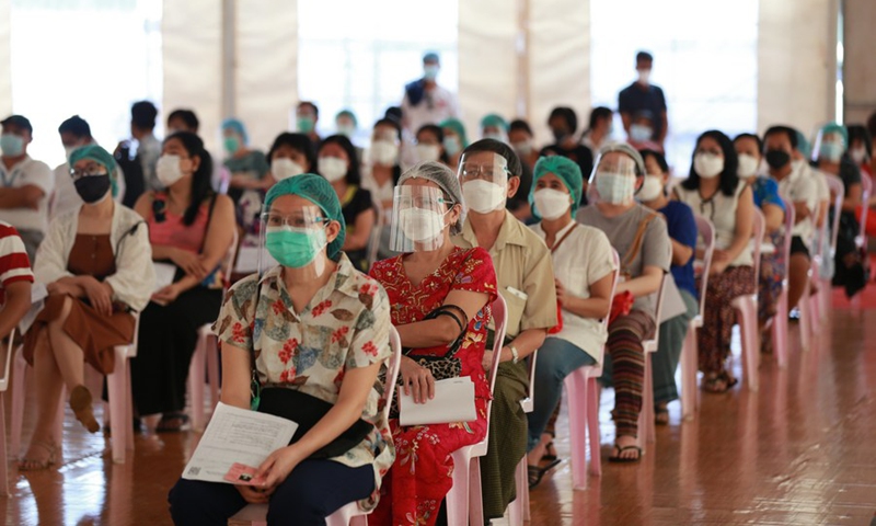 People wait to receive China's Sinopharm COVID-19 vaccines at Myanmar Chinese Chamber of Commerce's COVID-19 Vaccination Center in Yangon, Myanmar, Sept. 1, 2021.(Photo: Xinhua)