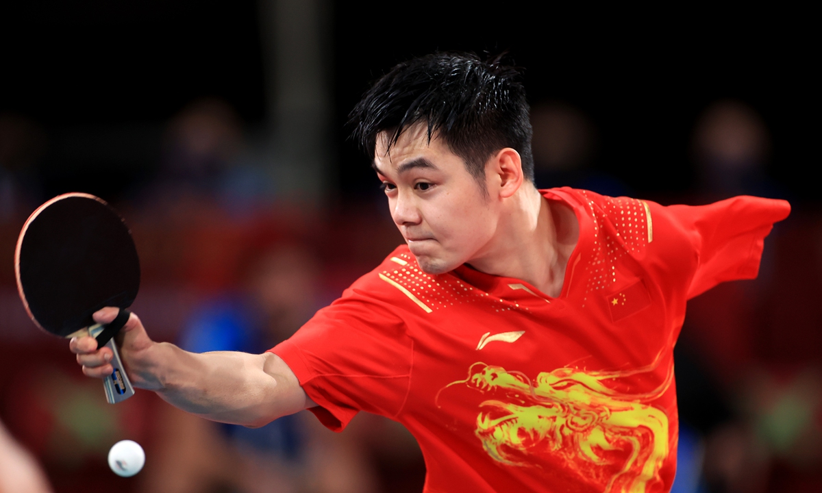 Zhao Shuai competes during the men's team - Class 8 table tennis gold-medal match. Photo: VCG