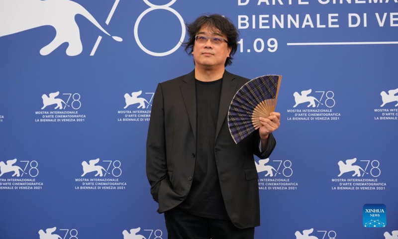 President of the main competition jury Bong Joon-Ho poses for photos during a photocall at the 78th Venice International Film Festival in Venice, Italy, on Sept. 1, 2021. The 78th Venice International Film Festival kicked off in the Italian lagoon city on Wednesday evening, amid still stringent anti-pandemic measures, and a large line-up that includes the world premiere of Pedro Almodovar's new film Parallel Mothers. Photo: Xinhua 
