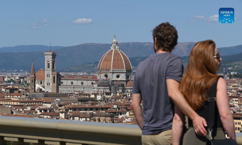 Tourists walk at Piazza della Signoria in Florence, Italy, on Sept. 2, 2021.Photo:Xinhua