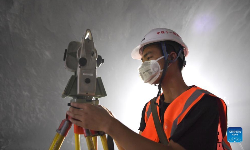 A worker prepares the drill-through of a railway tunnel in Du'an Yao Autonomous County, south China's Guangxi Zhuang Autonomous Region. Sept. 1, 2021.Photo:Xinhua
