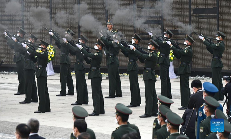 Soldiers fire a gun salute during a burial ceremony for the remains of 109 Chinese People's Volunteers (CPV) martyrs at the CPV martyrs' cemetery in Shenyang, northeast China's Liaoning Province, Sept. 3, 2021.Photo:Xinhua