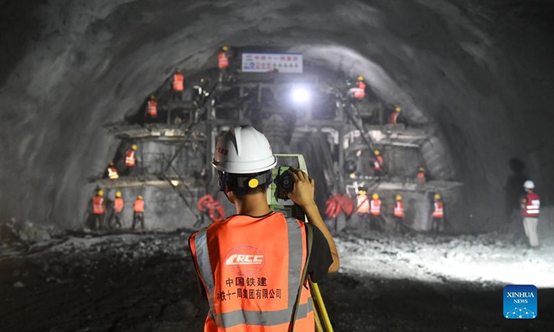 Workers prepare the drill-through of a railway tunnel in Du'an Yao Autonomous County, south China's Guangxi Zhuang Autonomous Region. Sept. 1, 2021.Photo:Xinhua