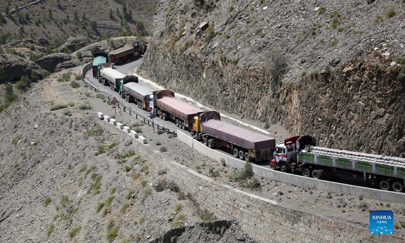 Photo taken on Sept. 3, 2021 shows truck drivers waiting to cross border near the border crossing point of Torkham between Pakistan and Afghanistan.Photo:Xinhua