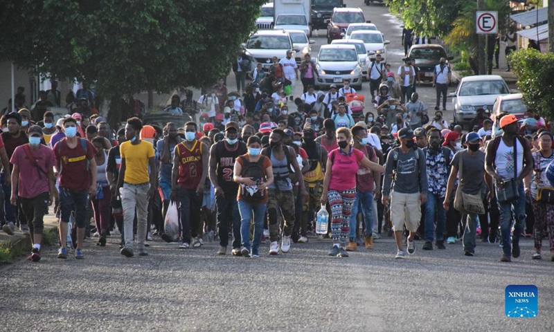 Migrants walk in a caravan bound for the United States, in Tapachula, state of Chiapas, southern Mexico, on Sept. 4, 2021. Migrant caravans traveling from Central America to the Mexican border with the United States became frequent since 2018. Photo: Xinhua