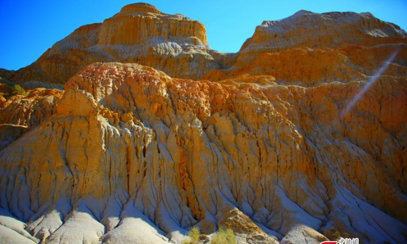 Photo taken on Sept. 5, 2021 shows the scenery of Devil City Scenic Spot in Fuhai County of Altay, Northwest China's Xinjiang Uygur Autonomous Region. The scenic spot is located in the east bank of Jili Lake, featuring Yardang landform and water landscape. Photo:CNSPhoto