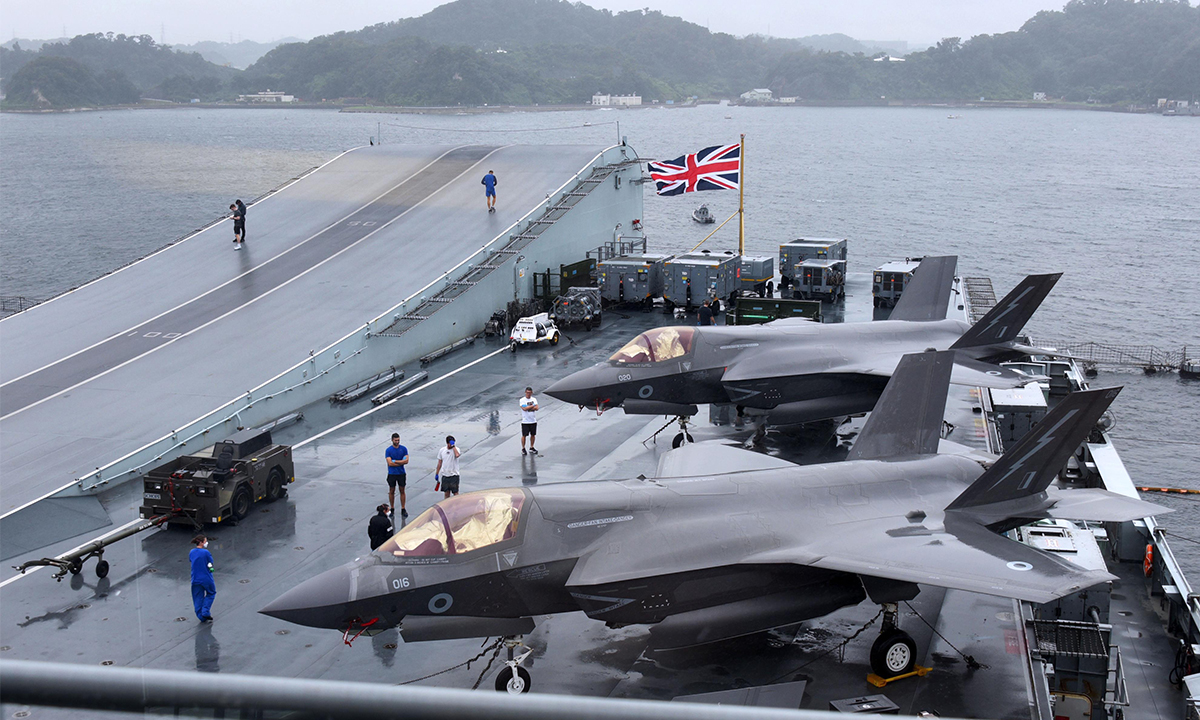 Photo taken on Monday shows F-35B fighter jets on the deck of British aircraft carrier the Queen Elizabeth at the US Navy base in Yokosuka, southwest of Tokyo. Photo: AFP