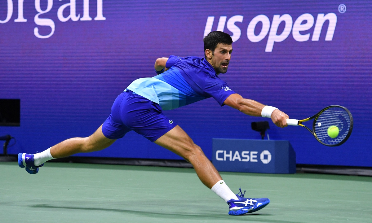 Novak Djokovic hits a return to Jenson Brooksby on Monday in New York City. Photo: VCG