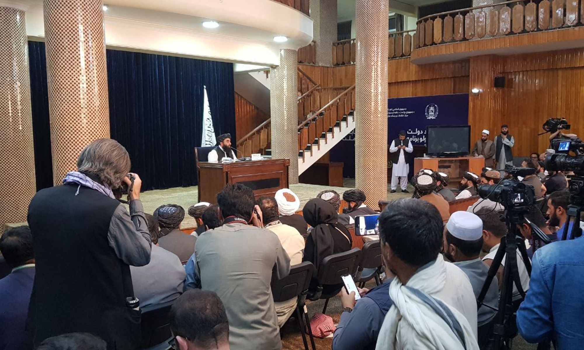Taliban spokesperson Zabihullah Mujahid holds a press conference in Kabul, Afghanistan on Tuesday. Mujahid announced the new government to rule the country. The Taliban announced Mullah Mohammad Hasan Akhund as the interim leader, while giving key positions to some of the movement’s top officials. Photo: AFP