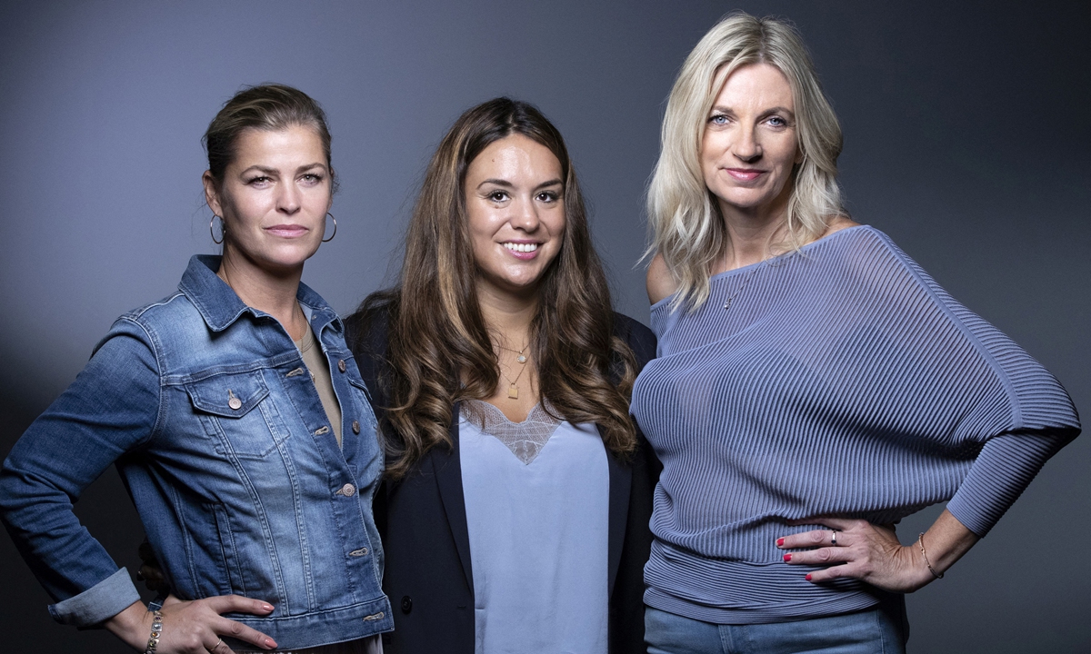 Ebba Karlsson, Anne-Claire Le Jeune (C) and Lisa Brinkworth pose during a photo session in Paris on September 3. Photo: AFP