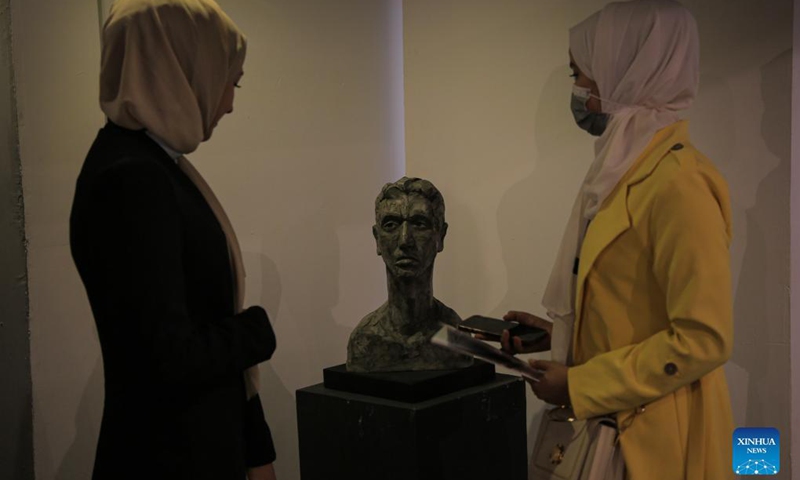 People visit an art exhibition at a contemporary art center in Gaza City, on Sept. 6, 2021. The artist depicted through his sculptures young Palestinians who lost their limbs during the wars and conflicts with Israel and the Great March of Return in the Gaza Strip.(Photo: Xinhua)