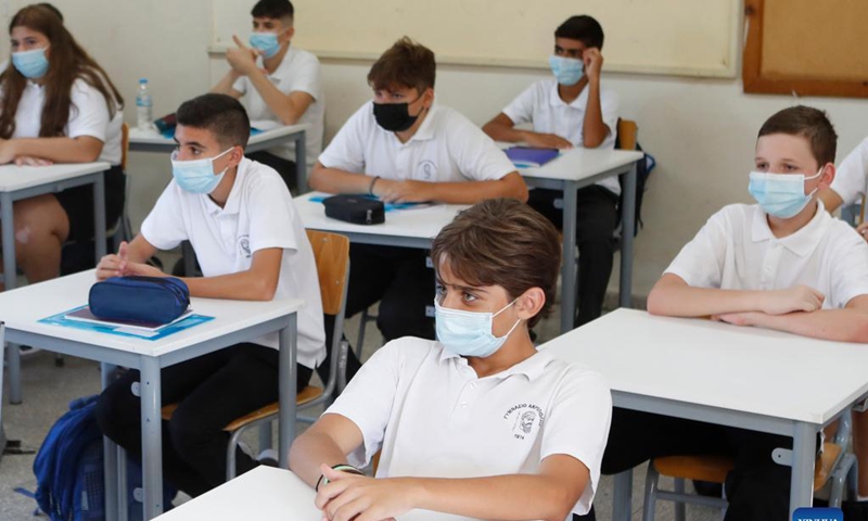 Students wearing face masks attend a class on the first day of a new school year in Nicosia, Cyprus, Sept. 7, 2021.(Photo: Xinhua)