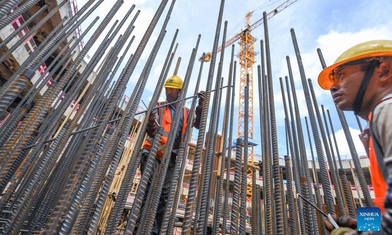 Workers operate at the construction site for a comprehensive traffic hub in Qianhai, Shenzhen City, south China's Guangdong Province, on Sept. 8, 2021.Photo:Xinhua