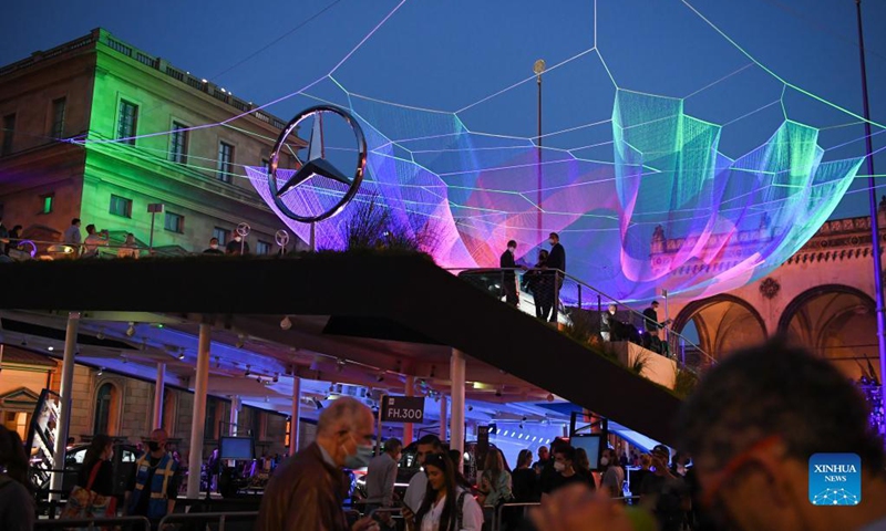 People visit the Mercedez-Benz outdoor booth during the International Motor Show Germany (IAA Mobility) in Munich, Germany, Sept. 8, 2021. The IAA Mobility, with the slogan What will move us next, is held here from Sept. 7 to 12. Photo: Xinhua