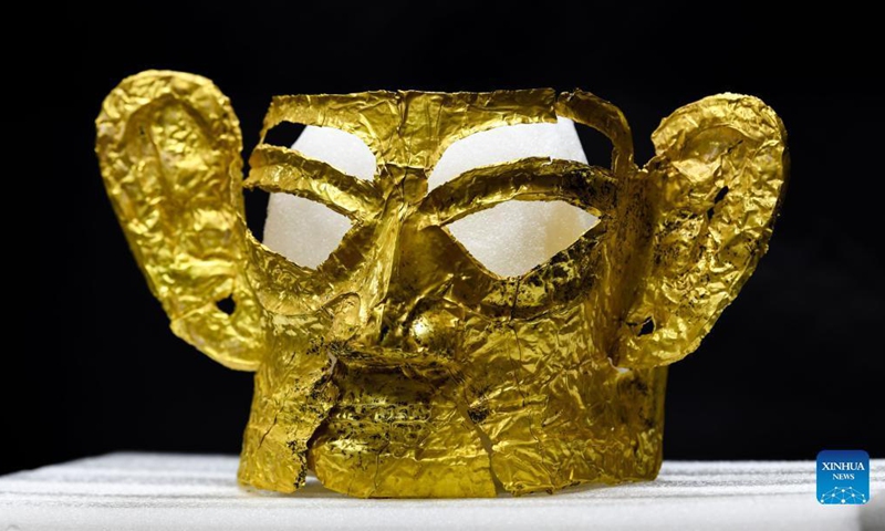 Photo taken on Sept. 2, 2021 shows a golden mask discovered at the No. 3 sacrificial pit of the Sanxingdui Ruins site in southwest China's Sichuan Province. More than 500 pieces of relics have been discovered in recent months at the legendary Sanxingdui Ruins site, dazzling archaeologists with their historical value as well as the display of creativity and ingenuity.Photo: Xinhua 
