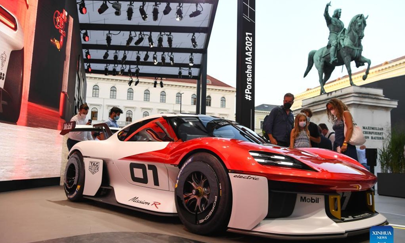 A Porsche electric racing car is on display at the Porsche outdoor booth during the International Motor Show Germany (IAA Mobility) in Munich, Germany, Sept. 8, 2021. With the slogan What will move us next, IAA Mobility focuses on green mobility, featuring electric cars and even bicycles.Photo: Xinhua