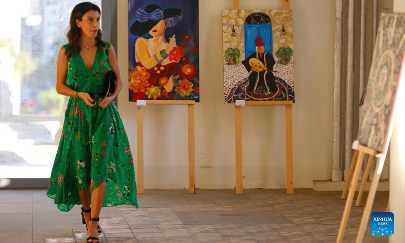 A woman visits an art exhibition in Beirut, Lebanon, on Sept. 8, 2021. Photo: Xinhua