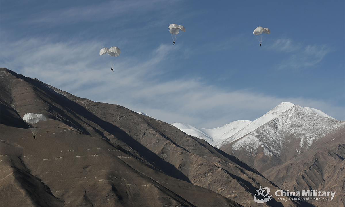 Troops assigned to a special operations brigade under the PLA Xinjiang Military Command conduct parachuting training in plateau area on August 31, 2021. This exercise effectively beefed up the troops' operation skills in plateau area. (eng.chinamil.com.cn/Photo by Shan Chuangyang)